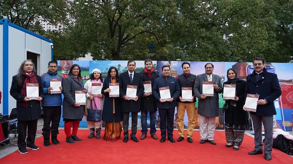 Consular delegation holding new publications